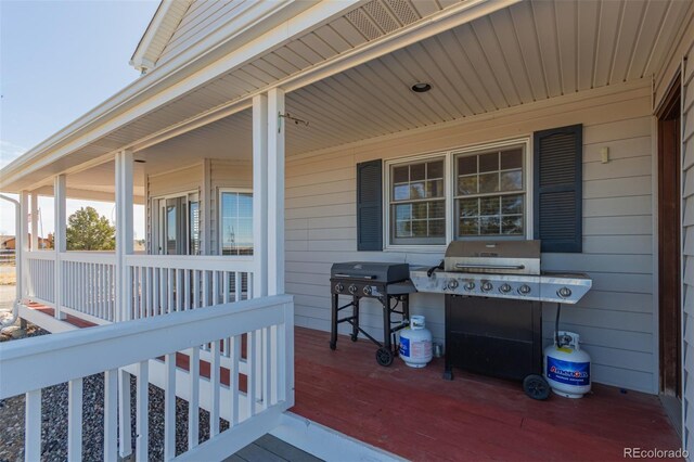 view of patio / terrace featuring grilling area and a porch