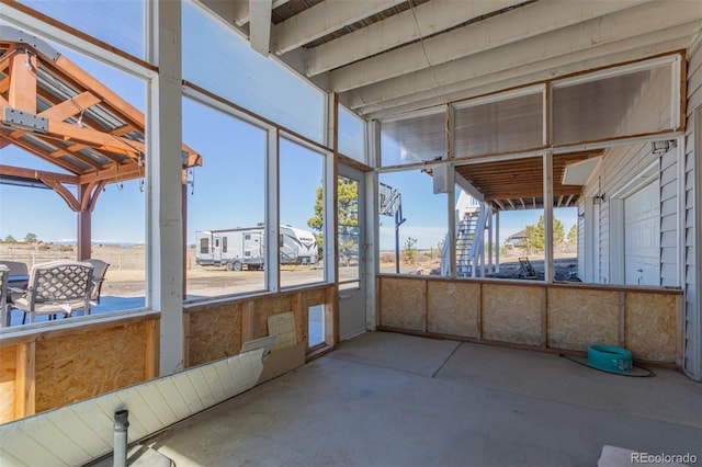 view of unfurnished sunroom