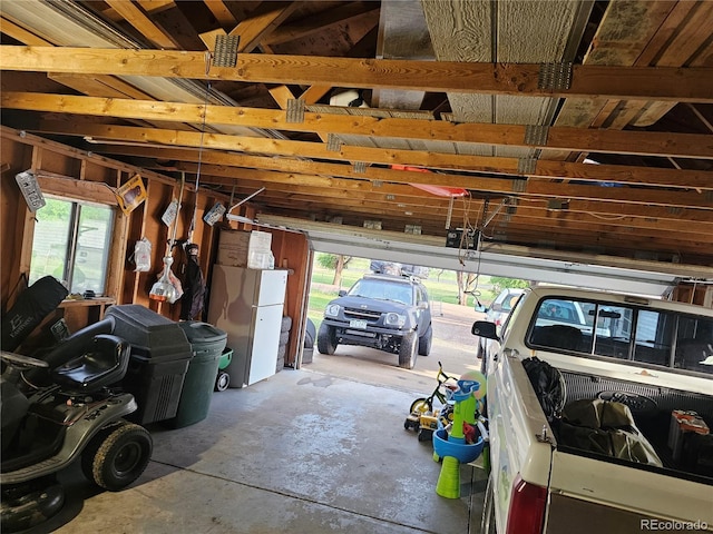 24797 Pleasant Hill Ave, Galeton, CO 80622 - garage with freestanding refrigerator