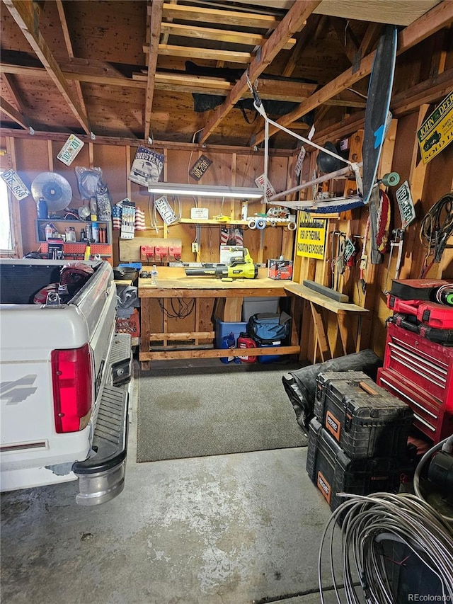 24797 Pleasant Hill Ave, Galeton, CO 80622 - garage featuring a workshop area