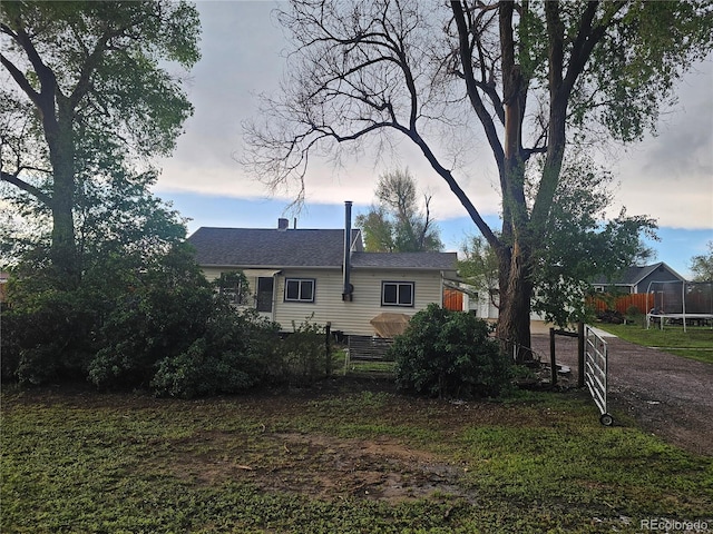 24797 Pleasant Hill Ave, Galeton, CO 80622 - view of front facade with a trampoline