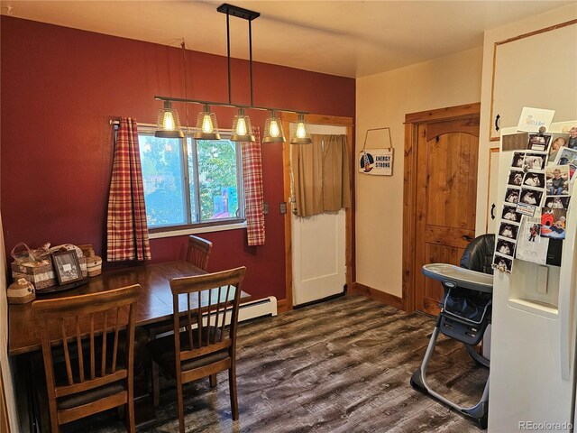 24797 Pleasant Hill Ave, Galeton, CO 80622 - dining space with dark wood-type flooring