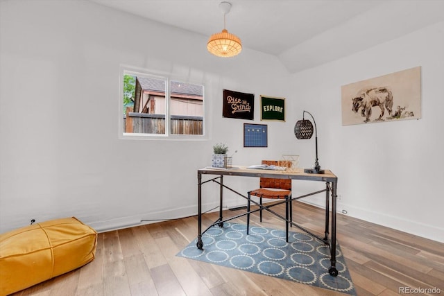 211 E Emma St, Lafayette, CO 80026 - office with baseboards, wood finished floors, and lofted ceiling