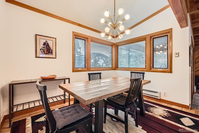 dining area with ornamental molding, vaulted ceiling, a wealth of natural light, and a notable chandelier