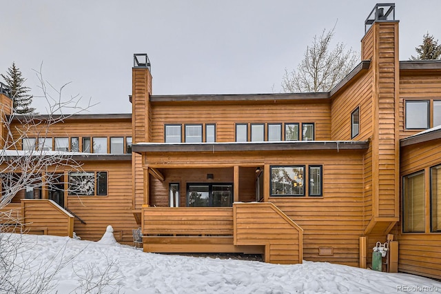 view of snow covered property