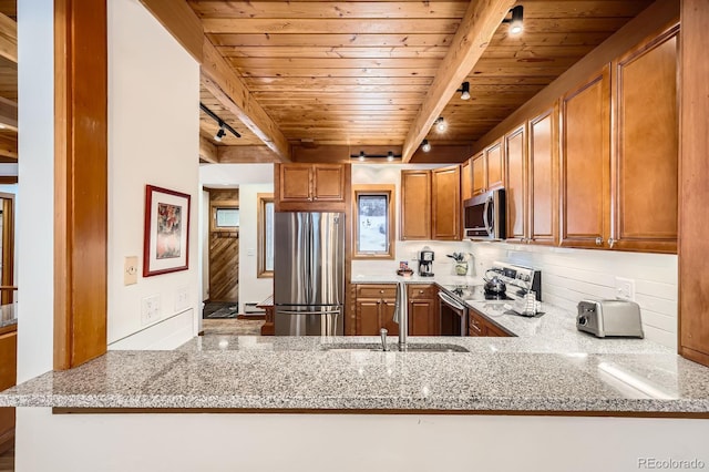 kitchen with light stone countertops, stainless steel appliances, wooden ceiling, beamed ceiling, and kitchen peninsula