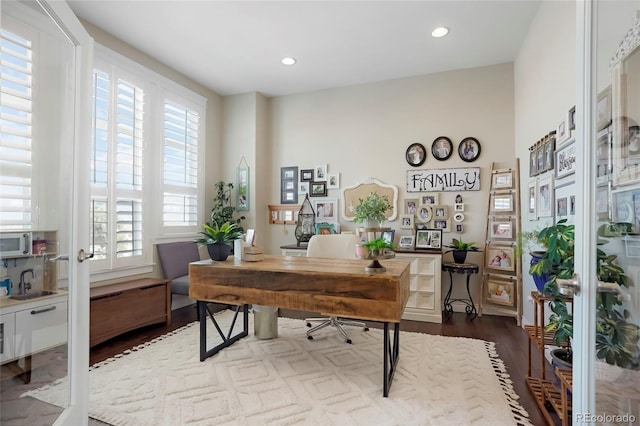 office area featuring recessed lighting, dark wood-style floors, and a sink