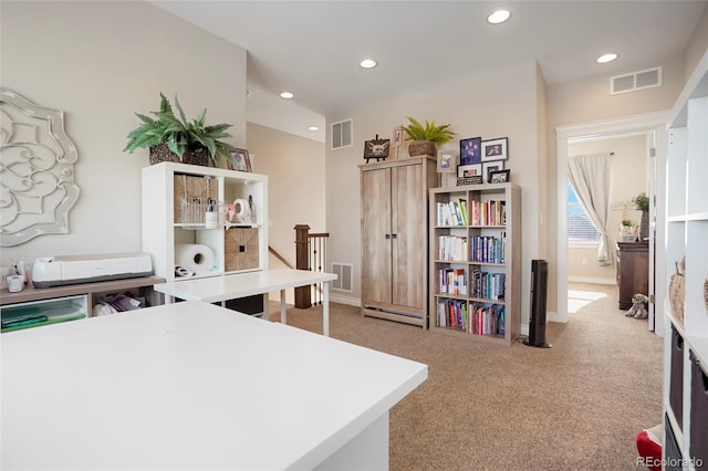 office area featuring baseboard heating, recessed lighting, and visible vents