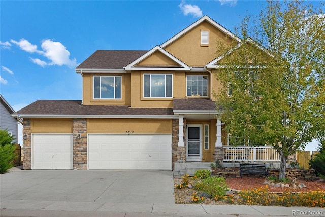 craftsman house with a garage