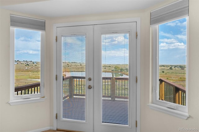 doorway to outside with french doors and plenty of natural light