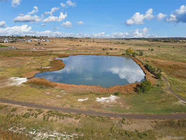 bird's eye view with a rural view and a water view