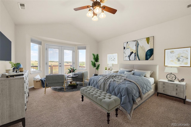 carpeted bedroom with access to exterior, ceiling fan, french doors, and vaulted ceiling