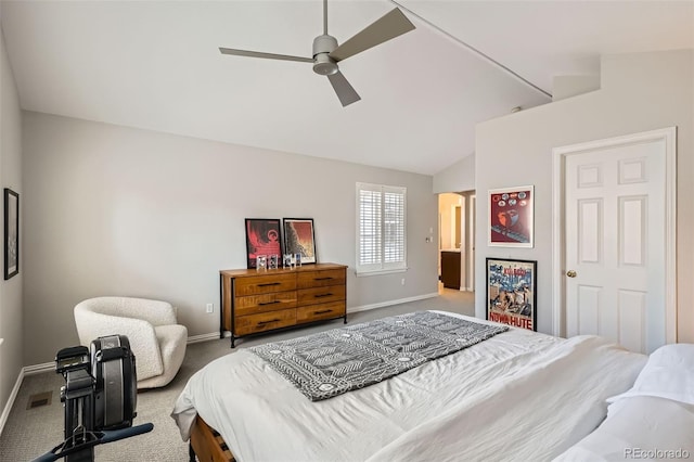 8300 Fairmount Dr Unit Aa102, Denver, CO 80247 - carpeted bedroom with vaulted ceiling, baseboards, arched walkways, and ceiling fan