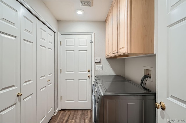 8300 Fairmount Dr Unit Aa102, Denver, CO 80247 - clothes washing area featuring cabinet space, washer and clothes dryer, dark wood-style floors, and recessed lighting