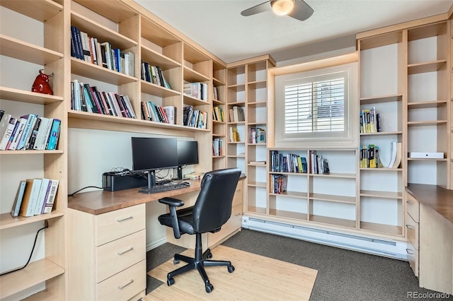 8300 Fairmount Dr Unit Aa102, Denver, CO 80247 - office space featuring built in study area, baseboard heating, and a ceiling fan