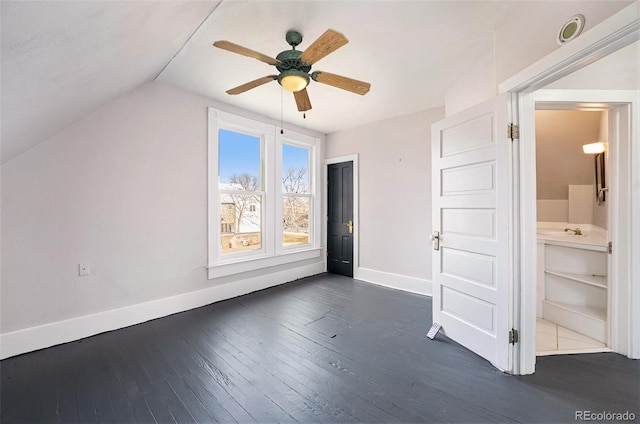 bonus room with lofted ceiling, dark hardwood / wood-style floors, and ceiling fan