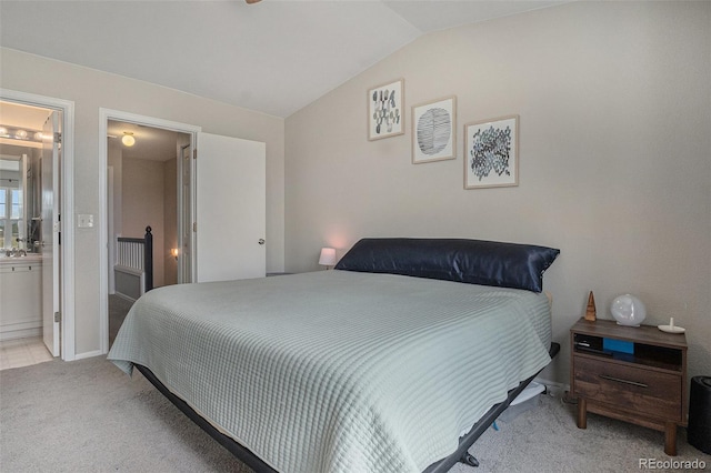 8259 S Fillmore Cir, Centennial, CO 80122 - carpeted bedroom with vaulted ceiling and ensuite bath