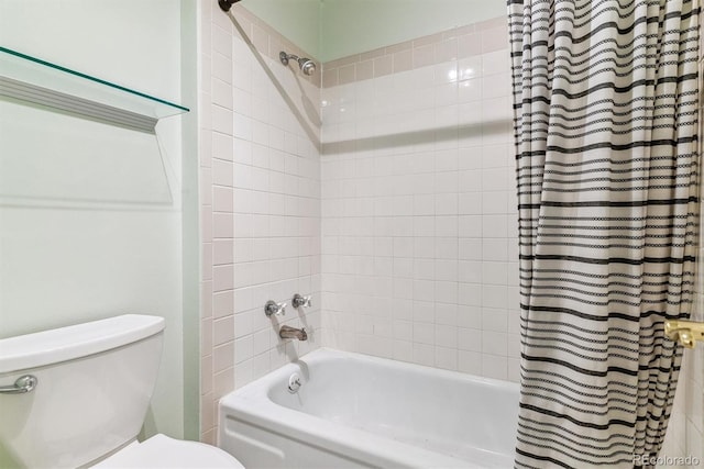 bathroom with shower / bath combo and toilet