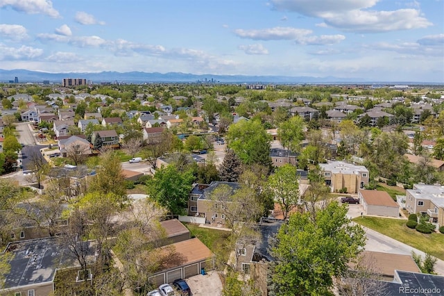 view of property location with nearby suburban area and a mountain backdrop