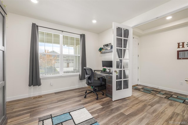 office area featuring hardwood / wood-style floors