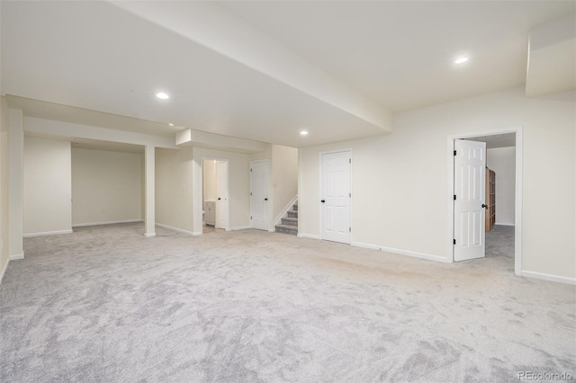 basement with light colored carpet