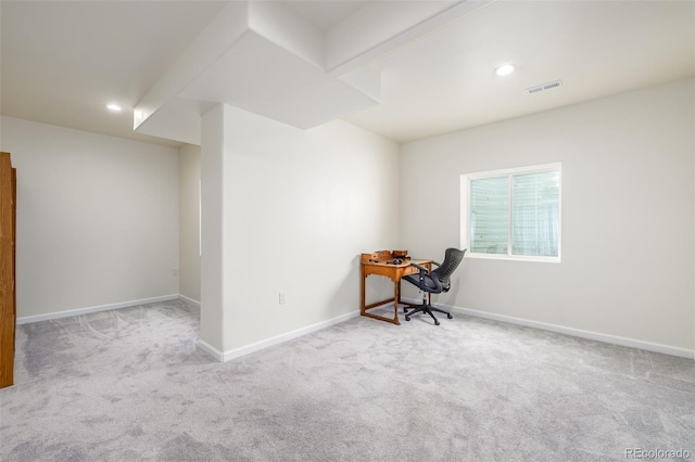 unfurnished office with light colored carpet