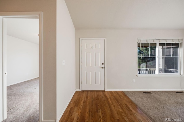 entrance foyer featuring dark wood-type flooring