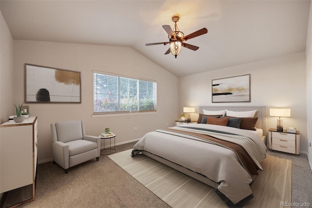 bedroom with vaulted ceiling, light colored carpet, and ceiling fan