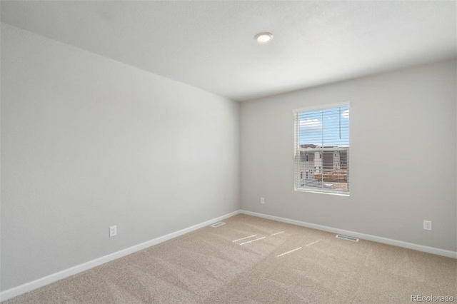 7303 Dolores Ave, Frederick, CO 80530 - spare room featuring light carpet and baseboards