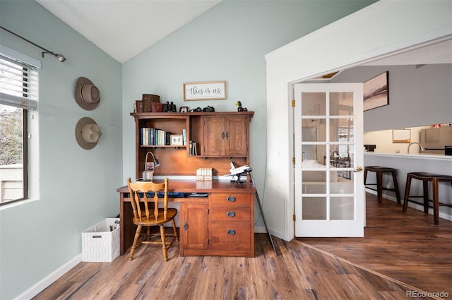 3600 S Pierce St Unit 1-207, Denver, CO 80235 - office space with vaulted ceiling, wood finished floors, french doors, baseboards, and a sink