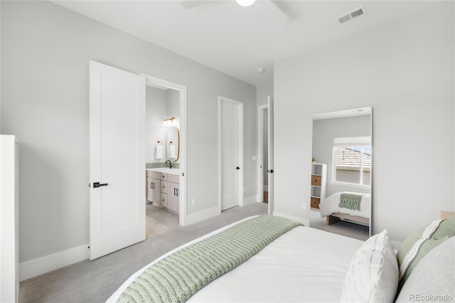 4868 Hogback Ridge Rd, Morrison, CO 80465 - bedroom featuring light colored carpet, baseboards, connected bathroom, and ceiling fan