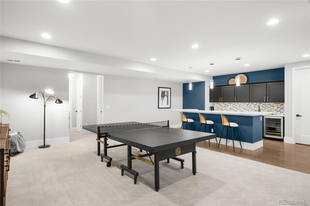 4868 Hogback Ridge Rd, Morrison, CO 80465 - rec room featuring wine cooler, bar with sink, recessed lighting, and baseboards