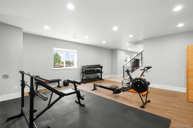 4868 Hogback Ridge Rd, Morrison, CO 80465 - workout room with recessed lighting, baseboards, and wood finished floors