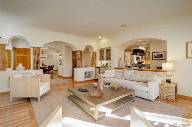 living room with light hardwood / wood-style flooring