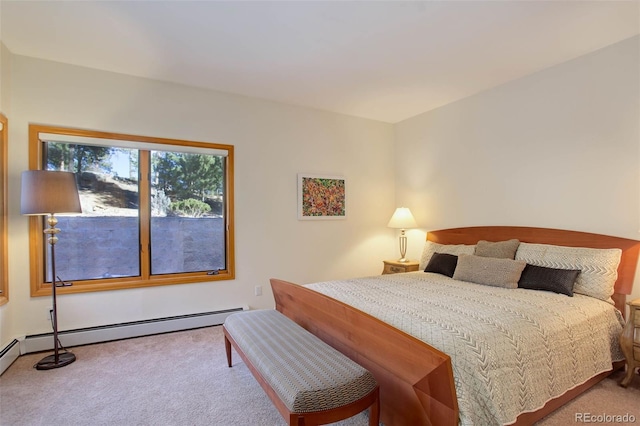 bedroom featuring carpet flooring and a baseboard radiator