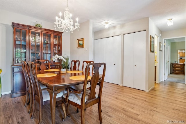 dining room with light wood-type flooring