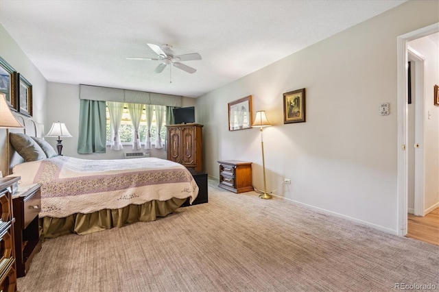 carpeted bedroom with ceiling fan