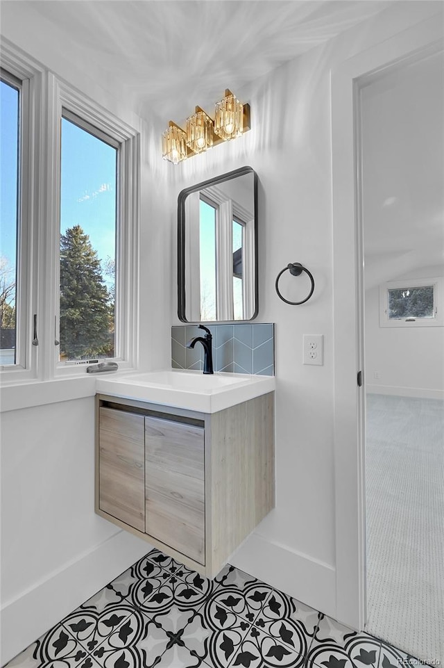 bathroom featuring tile patterned floors and vanity