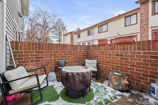 view of snow covered patio