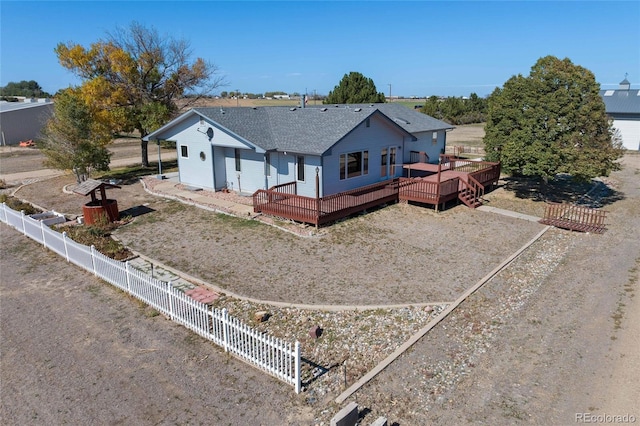 view of front facade featuring a wooden deck