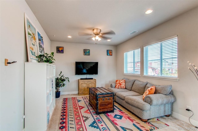 living room featuring ceiling fan