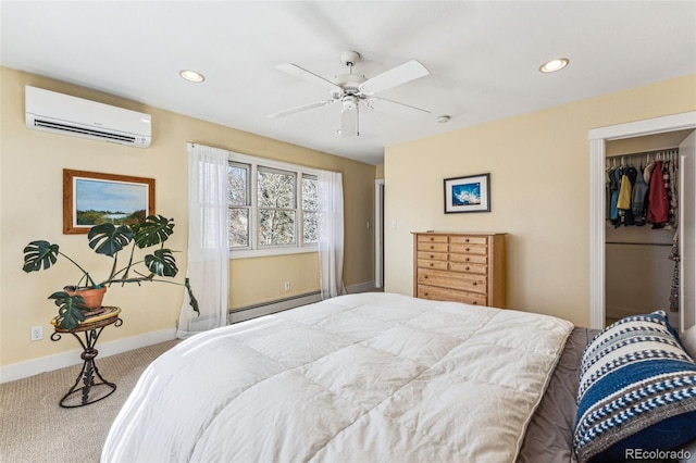 bedroom with a baseboard radiator, recessed lighting, carpet flooring, baseboards, and an AC wall unit