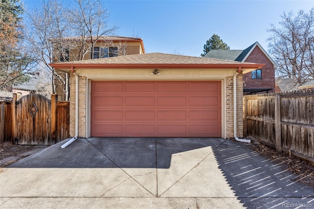 garage featuring fence