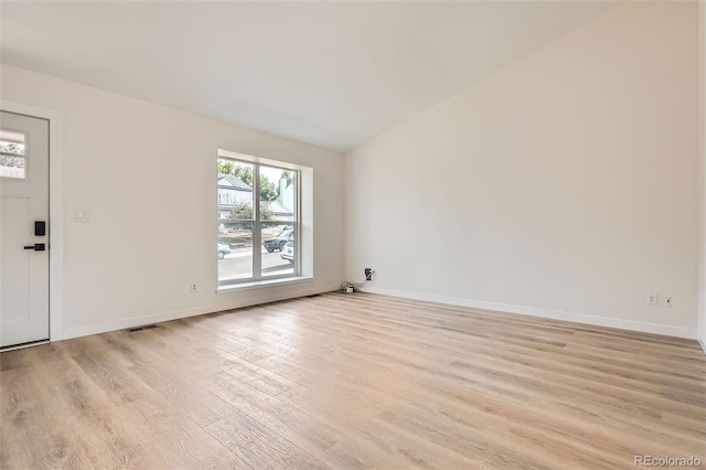 19859 E Prentice Pl, Centennial, CO 80015 - spare room featuring light wood-style floors and lofted ceiling