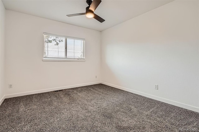 19859 E Prentice Pl, Centennial, CO 80015 - empty room featuring dark carpet and a ceiling fan