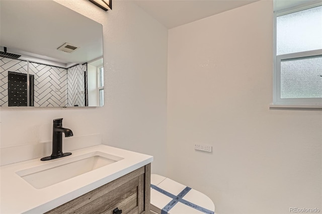 19859 E Prentice Pl, Centennial, CO 80015 - bathroom featuring vanity and decorative backsplash