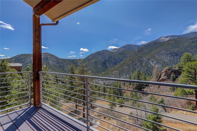 balcony featuring a mountain view