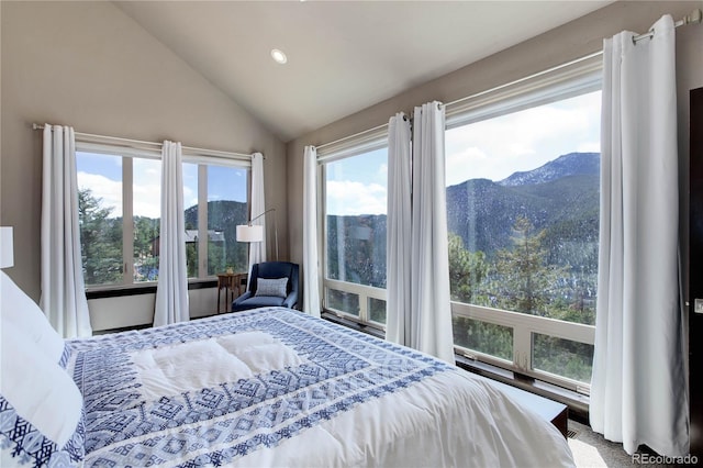 bedroom featuring a mountain view, recessed lighting, and lofted ceiling