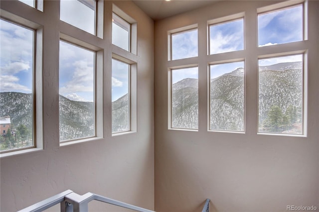 interior space featuring a mountain view and plenty of natural light