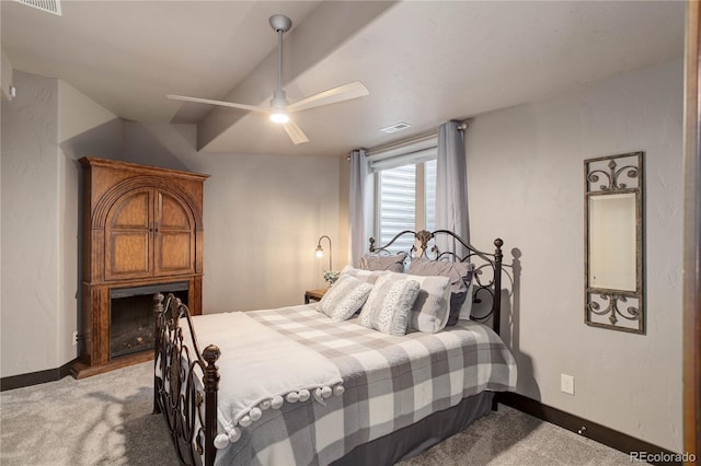 bedroom featuring light colored carpet, baseboards, and visible vents
